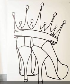 a drawing of a shoe with a crown on top