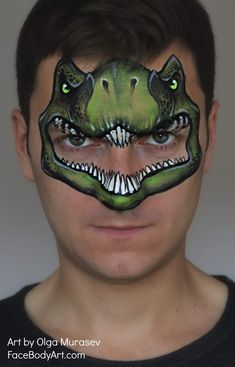 T-Rex Gace Painting Design by Olga Murasev Dragon Face Painting, Mask Face Paint, Animal Face Paintings, Rainbow Dinosaur