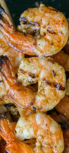 grilled shrimp and carrots on a plate