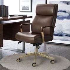 a brown office chair sitting on top of a white rug