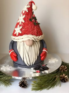 a cake with a santa clause hat on top of it