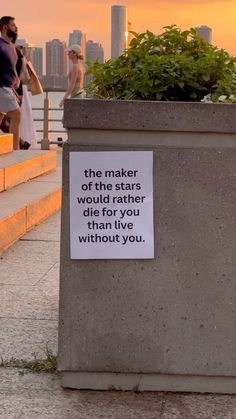 a cement planter with a sign that says the maker of the stars would rather be you than i live without you