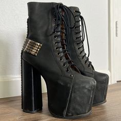 One Of A Kind!!!!! These Platforms Are Absolutely Incredible. Worn Once With Perfect Soles And Minor Scuffs. They Come In The Original Packaging With Extra Spikes. Designer Black Platform Boots For Party, Edgy Leather Heels For Streetwear, Designer Black High Heel Platform Boots, Black Leather Platform Boots With Studs, Black High-top Spiked Platform Boots, Black Studded Leather Platform Boots, Black Leather Studded Platform Boots, Luxury Black Chunky Platform Heels, Jeffery Campbell Boots Platform