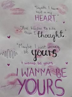 a piece of paper with writing on it and some words written in pink ink next to each other