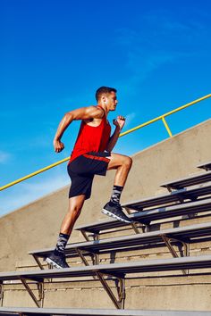 a man is running down some steps