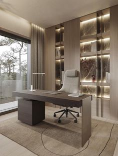 an office area with a desk, chair and bookcase in front of a large window