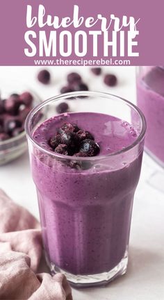 blueberry smoothie in a glass with berries on the side and text overlay