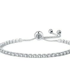 Coming Soon To My Closet. Please Like To Get Discount Notifications. Elegant, Subtle And Regal, This Cz Tennis Bracelet Is A Great Piece To Add To Your Collection. Perfect For Pulling Together A Semi-Casual Outfit Or When You Want To Pair It With Other Pieces For A Night Out. It Will Illuminate Your Look Whenever You Need To, Adding Twinkle And Elegance To Any Outfit. This Radiant And Glimmering Bracelet Makes For A Great Gift. Formal Bracelets With Adjustable Chain And Cubic Zirconia, Adjustable Diamond Bracelet With Diamond Accents, Adjustable Silver Cubic Zirconia Tennis Bracelet, Adjustable Silver Diamond Bracelet With Prong Setting, Adjustable Diamond White Tennis Bracelet, Adjustable Dazzling White Gold Tennis Bracelet, Diamond Tennis Bracelet With Adjustable Chain For Formal Events, Dazzling Adjustable White Gold Tennis Bracelet, Elegant Diamond Tennis Bracelet With Adjustable Chain