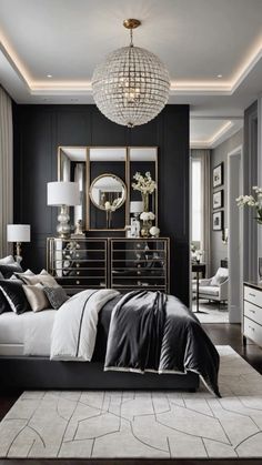 a black and white bedroom with gold accents