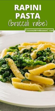 pasta with broccoli and cheese on a white plate next to a green napkin