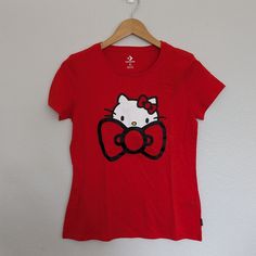 Brand New Never Worn Hello Kitty X Converse Collab Red Tshirt Size Small Women’s Red Hello Kitty Print Crew Neck Top, Red Crew Neck Top With Hello Kitty Print, Casual Red Hello Kitty Top, Cute Red Fitted T-shirt, Cute Fitted Red T-shirt, Red Hello Kitty Cotton T-shirt, Red Hello Kitty Short Sleeve Tops, Red Cotton Hello Kitty T-shirt, Converse Cotton Graphic Tee