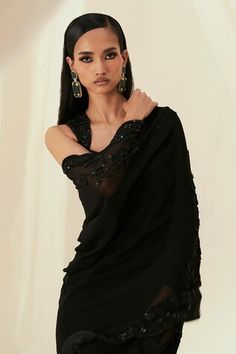 Black pre-draped saree featuring sequin and beads embroidery in floral bunch motifs with a scallop border. Paired with an embroidered padded blouse and cutout back design., Fit: Relaxed Sarees Black, Draped Saree, Scallop Border, Padded Blouse, Drape Saree, Beads Embroidery, Set For Women, Aza Fashion, Beaded Embroidery