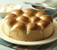 a bun is sitting on a plate and ready to be served as a dessert or appetizer