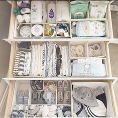 a drawer filled with lots of baby items