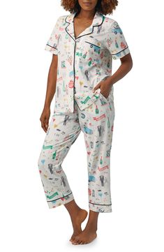 Comfy jersey pajamas are finished with a pop of contrast trim and covered in a fun print for a charming look in or out of bed. 26" top length; 25" inseam Top has front button closure; notched collar; short sleeves; chest patch pocket Bottoms have elastic waist; front slant pockets 93% organic cotton, 7% elastane Machine wash, tumble dry Imported White Graphic Print Sleepwear For Loungewear, Jersey Pajamas, Pyjamas Womens, Bed Head, Notch Collar, Notched Collar, Pajama Shorts, Pj Sets, Just Married