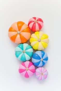 colorful candy candies are arranged on a white surface