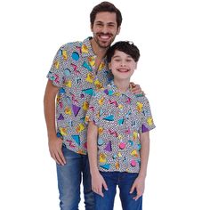 Your family is looking cool and concert ready in this stylish Family Matching MTV collared button up shirt! Enjoy your favorite music videos and reality tv shows in this soft and comfy tee featuring an all-over print of the iconic MTV logo with a neon retro shape design! With both kids and adult sizes, the whole family can rock out to their favorite songs in style! Music-themed Relaxed Fit Tops For Summer, Unisex Casual Shirt With Funny Print, Fun Printed Short Sleeve Shirt, Trendy Summer Shirt For Concerts, Multicolor Casual Tops For Concert, Summer Concert Short Sleeve Shirt, Short Sleeve Shirt For Spring Concert, Casual Multicolor Tops For Concert, Spring Concert Short Sleeve Shirt