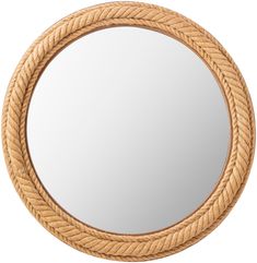 a round mirror with rope around it