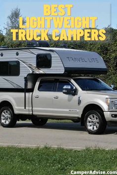 a truck with a camper attached to the bed