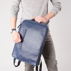 Saola Leather Laptop Backpack · Navy by Capra Leather Modern Backpack With Adjustable Strap For On-the-go, Modern Laptop Backpack With Adjustable Strap, Versatile Rectangular Blue Backpack, Functional Laptop Bag With Adjustable Strap, Blue Standard Backpack For Everyday Use, Modern Travel Accessories Backpack With Zipper Pocket, Modern Laptop Bag With Adjustable Strap For School, Versatile Backpack With Detachable Strap For Business, Everyday Blue Standard Backpack Travel Bag