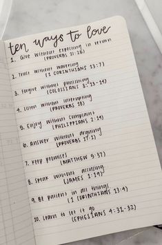 an open notebook with the words ten ways to love written on it