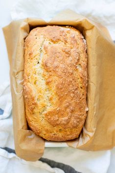 a loaf of bread in a brown paper bag