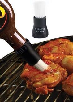 a bbq brush is being used to clean chicken wings on the grill with sauce