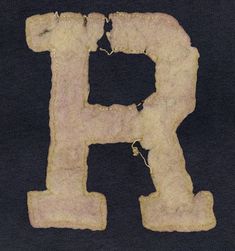 the letter h is made out of paper