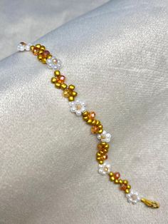 Autumn floral beaded bracelet Adjustable Beaded Bracelet For Wedding With Colorful Beads, Adjustable Colorful Beaded Wedding Bracelets, Adjustable Wedding Beaded Bracelets With Colorful Beads, Adjustable Wedding Beaded Bracelet With Colorful Beads, Elegant Flower Crystal Bracelet For Spring, Elegant Flower Shaped Crystal Bracelet For Spring, Elegant Beaded Flower Crystal Bracelet, Elegant Yellow Flower Bracelets, Elegant Flower-shaped Beaded Crystal Bracelet