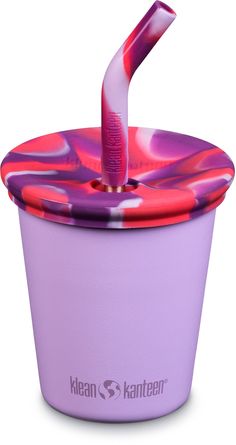 a purple cup with a pink toothbrush sticking out of it's top lid