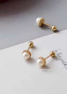 🍃--Details-- Handmade item Materials: Solid Gold (no gold filled or gold plated) Gold Kt: 10K Gemstone: Freshwater Pearl Gem colour:white Style: Minimalist & Modern & Classic Made to Order 🍃--Description-- ❤️All components of the Earrings are genuine 14ct Gold. ❤️10K Solid Gold Natural Freshwater Pearl Tiny Stud Earrings, 10K Real Gold Pearl ball end piercing, Cartilage Helix 2nd/3rd earlobe Piercings 🍃Ring Features  ✪ 10k Solid Gold  (no gold filled or gold plated) ✪ AAA Grade Natural Freshwater Pearl ✪ Pearl Size :3.8*3.8mm ✪ Earring size : 4.8*4.8mm ✪ Thickness: 0.8 mm ✪ Gold Colour : Yellow Gold ✪ Made to Order  --Others Information--  🔧Making:  WIQEE Jewels' pieces made to order. Please allow 4 - 8 business days for manufacturing. Need it sooner? Just ask and we will let you know Classic Dangle Cartilage Earrings, Classic White Hypoallergenic Cartilage Earrings, Classic White Round Piercings, Classic White Cartilage Earrings As Gift, Hypoallergenic White Drop Cartilage Earrings, White Hypoallergenic Cartilage Earrings For Anniversary, Elegant Round Screw Back Piercings, Elegant Round Piercings With Screw Back, Earlobe Piercings