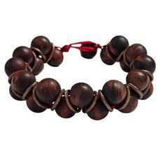 Details:- 10mm Matte Red Tigers Eye- Size: 7.75"- Copper accents- Macramé toggle closure- Genuine natural stones MATERIAL: Sturdy red adjustable cord; These are genuine beads. For long-lasting wear for years to come, we suggest not to wear this in the ocean, shower, or in the pool due to the harsh chemicals. Tigers Eye is an incredible healing stone and can be used in many ways to; align certain chakras, balance the body, sharpen the mind, and help you unpack and put away any emotional baggage y Red Adjustable Artisan Bracelet, Casual Adjustable Jewelry With Large Beads, Artisan Red Adjustable Bracelet, Adjustable Large Beaded Casual Jewelry, Casual Adjustable Large Beads Jewelry, Adjustable Red Beaded Bracelets With Wooden Beads, Adjustable Red Beaded Bracelets For Meditation, Adjustable Brown Jewelry With Large Beads, Artisan Adjustable Round Bracelet