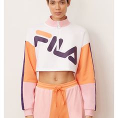 This One-Of-A-Kind Sweatshirt Features A Bold, Feminine Look Thanks To The Cropped Cut And Multicolor Block. A Half-Zip And Oversized Fila Logo Make It Stand Out Even More. Brushed Back Fleece: 80% Cotton/ 20% Polyester Mesh: 100% Polyester Fila Printed Chest Logo Half Zip Front Rib Funnel Neck With Ring Puller Mesh Inserts On Sleeves Rib Cuffs.