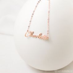 "♥ Dainty Name Necklace ♥ The most unique jewelry you can find, perfect gift for you and your loved one. D A I N T Y ∙ N A M E ∙ N E C K L A C E * Material: High Quality Solid 925 Sterling Silver * Dimensions: Depending on your font choice, height sizes range from 3mm to 4mm lowercase. * Finish: Sterling Silver ∙ 18K Gold ∙ Rose Gold * All our jewelry is custom made by hand with Love and Care in our workshop ♥ H O W ∙ T O ∙ O R D E R * Just let us know in the 'PERSONALIZATION BOX' as to what NAM Rose Gold Sterling Silver Name Necklace, Rose Gold Sterling Silver Name Pendant Necklace, Rose Gold Stainless Steel Name Necklace, Personalized Rose Gold Stainless Steel Name Necklace, Personalized Rose Gold Tarnish-resistant Name Necklace, Custom Name Necklace, Personalized Gifts For Her, Gifts For Wedding Party, Name Necklace