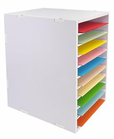 a white file cabinet filled with lots of different colored folders