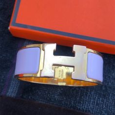 Hermes Pale Pink & Gold Click H Bracelet Size Gm Wide; Box & Pouch Included. Very Pale Pink And At Times Looks White, Gm Size Is 59 Mm = 2.34” Across. This Is The Wide Width At 20 Mm = .79”. Pink Hermes Bracelet, Hermes Bracelet White Gold, Pink Square Box Bag With Gold-tone Hardware, H Bracelet, Designer Pink Bag With Gold-tone Hardware, Pink Bag With Gold-tone Hardware And Double Handle, Box Pouch, Hermes Jewelry, Pink Gold