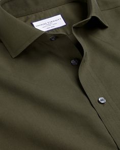 100% cotton, Available in classic, slim and extra slim fit, Non-iron, Spread collar, Classic and slim fit: back pleats, Extra slim fit: back darts, Mitred button cuff with two buttons, Machine washable - Cutaway Collar Non-Iron Poplin Shirt - Olive Green | Men's Charles Tyrwhitt Cutaway Collar Non-Iron Poplin Dress Shirt - Olive Green Single Cuff Size Medium Cotton Olive Green Dress Shirt Men, Olive Green Shirt Outfit Men, Olive Green Shirt Outfit, Green Shirt Outfits, Beige Pants Men, Olive Green Shirt Dress, Charles Tyrwhitt Shirt, Dress Shirt Men, Summer Shirts Men