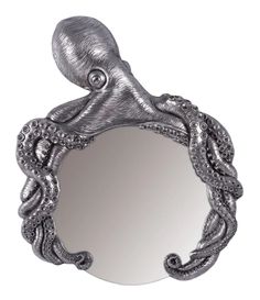 an octopus - like mirror is shown against a white background