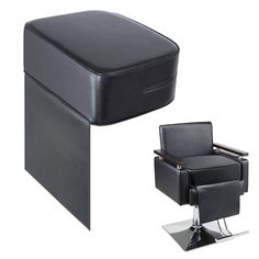 a black chair and footstool sitting next to each other on a white background