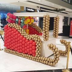 there is a large balloon sculpture made to look like a bed