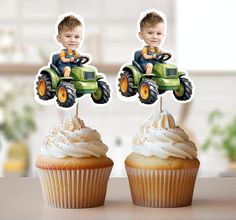 two cupcakes with the top one being a boy on a green tractor and another is holding a sign that says happy birthday