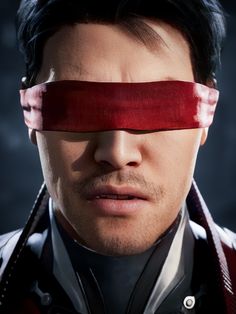 a man with a blindfold over his eyes