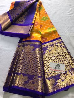 * Mangalagiri Pure Handloom Silk Saree with Kanchi Border with running blouse * Made by pure silk * No Cotton Mix * Beautiful Long Border come with golden zari * Ikkat puttas comes all over the body Festive Gold Traditional Wear With Silk Certification, Gold Dupatta With Silk Mark Certification And Traditional Drape, Gold Traditional Wear For Festivals With Silk Mark, Gold Traditional Wear With Silk Mark For Festivities, Gold Traditional Wear For Festive Season, Silk Mark Certified, Gold Traditional Wear Silk Mark Certified For Festivals, Festival Paithani Silk Dupatta With Silk Mark Certification, Festival Paithani Silk Dupatta Silk Mark Certified, Gold Silk Mark Certified Dupatta In Traditional Drape