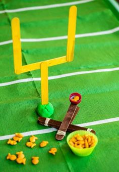 a football field made out of paper and some snacks