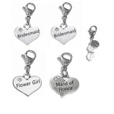 four charms with bridesmaid written on them in different styles and colors, including one heart