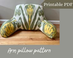 an arm pillow is sitting on the floor with text overlay that reads printable pattern