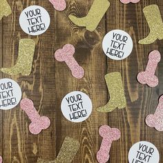 some pink and gold glittered feet are on a wooden surface with stickers that say your text here