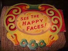 a sign that says see the happy faces