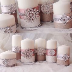 wedding candles with ribbons and bows on them are shown in three different pictures, one is white