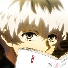 an anime character is reading a book with his eyes wide open